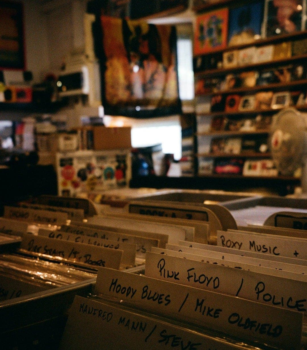 a room filled with lots of boxes of music